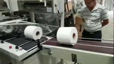 Maxi roll towel paper cutting machine and shrink packing machine