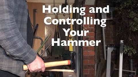 Blacksmith holding and controlling your hammer