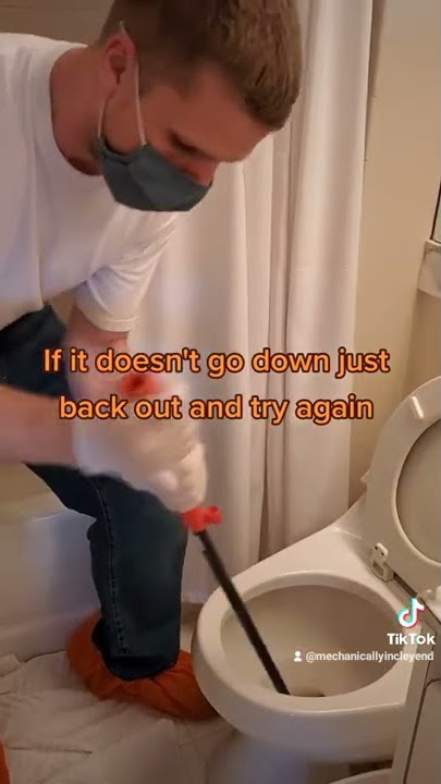 Using an auger to clear a clogged toilet – AHPI