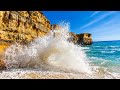 Epic Waves Crashing Against the Clif