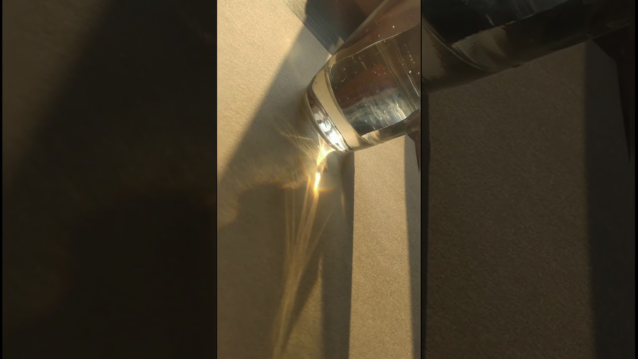 Descomposición de la luz blanca en su espectro visible (Experimento con