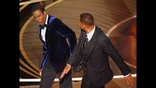 Watch the uncensored moment Will Smith smacks Chris Rock on stage at the Oscars, drops F bomb
