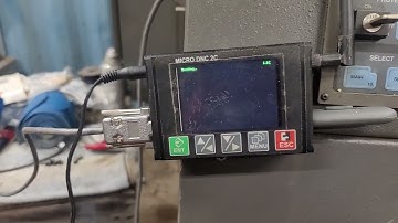 how to load a program into a Hardinde SG-42 using a micro DNC