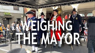 Weighing the Mayor