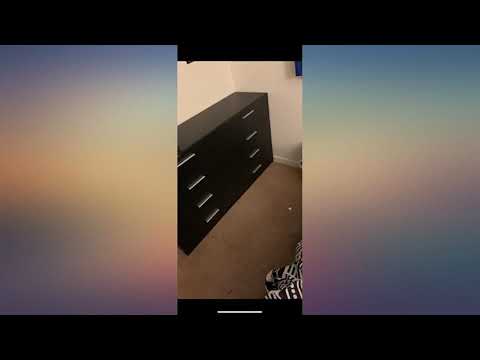 black eight drawer dresser