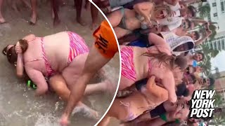 Bikini-clad co-eds brawl on beach in wild spring break video | New York Post