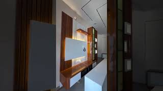 Wooden TV Unit Design with Marble Finish & LED Strip Lights