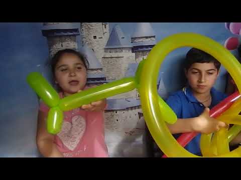 ბუშტებისგან ვაკეთებთ სხვადასხვა ფიგურებს და ცისარტყელას.