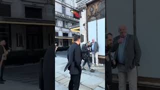 Tom Francis sings ‘Sunset Boulevard’ on the street outside the Savoy Theatre in London