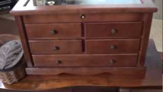 Just takeing a look at my knife chest/desplay case. It has 5 locking drawers and a glass top to store your knives under. Makes for a 