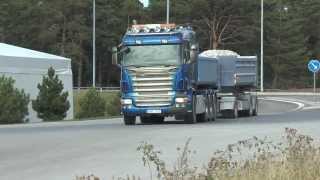 Many Scania trucks carrying crushed...