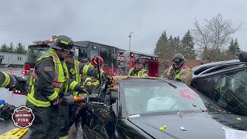 Firefighters Using Jaws of Life