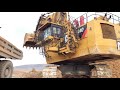 Cat 6040 Excavator Loading Hitachi Dumpers, Operator View