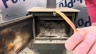 Starting a fire in wood stove with pine from woods “Fat Wood”