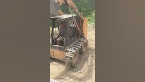 Bobcat loading dumptruck