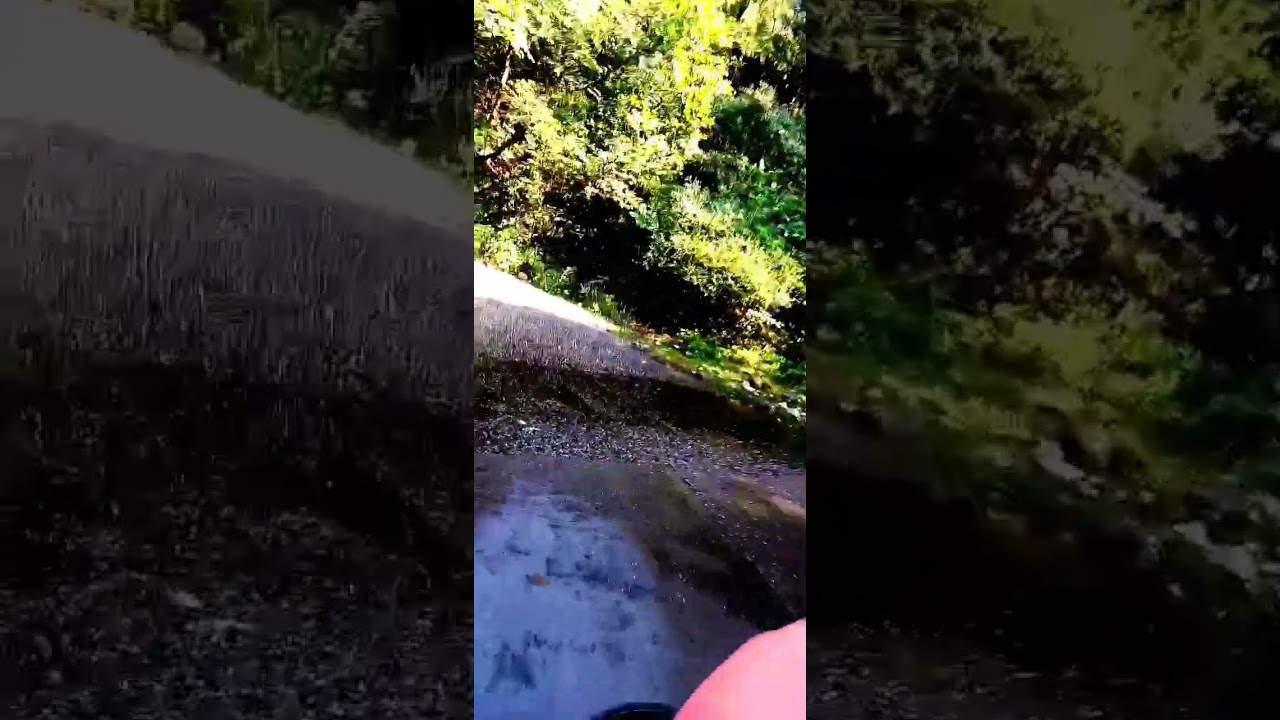 Bike riding between mountains🌧