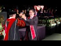 Biola university president does parent trap handshake with son at graduation