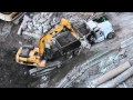 Excavator almost hit by dump truck!!