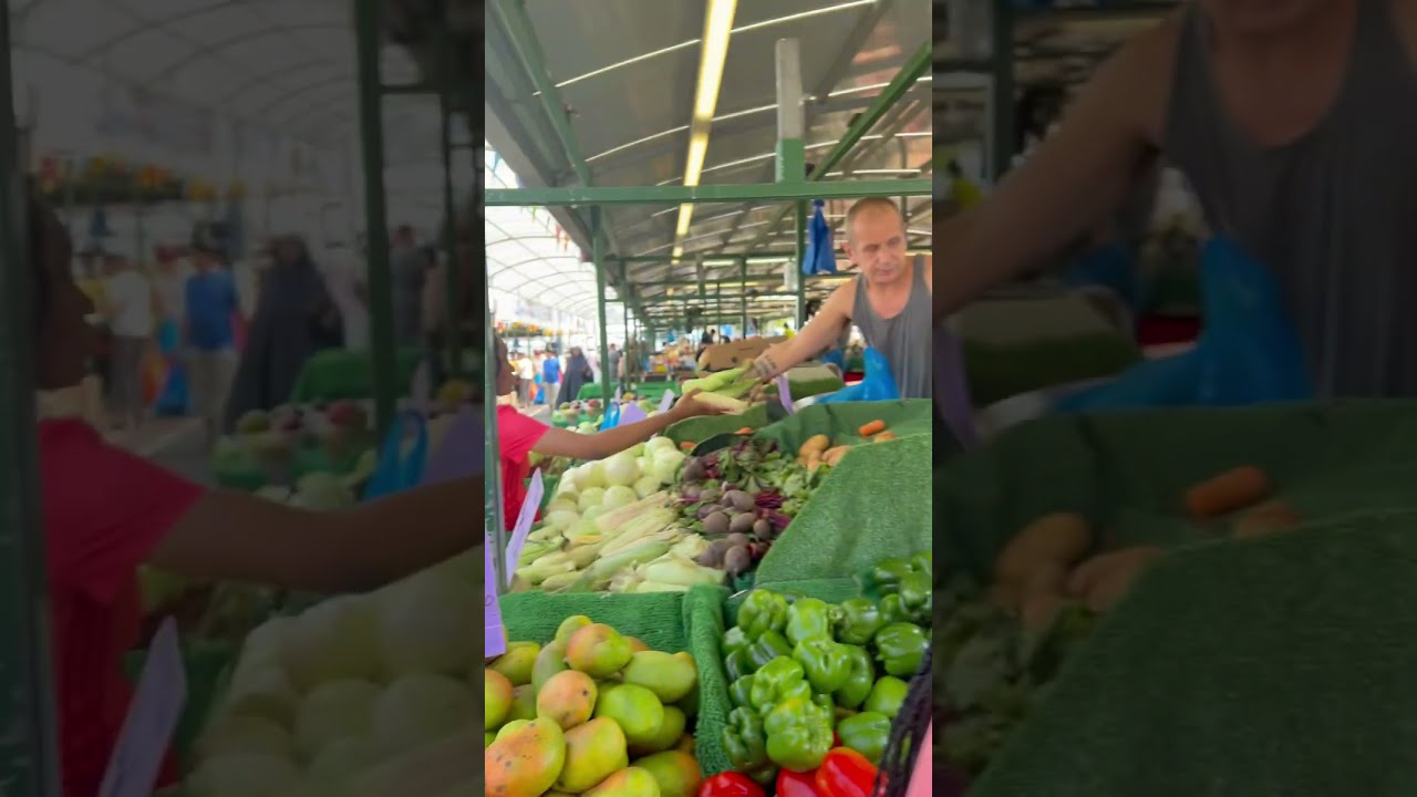 Buying Fruits And Veggies At London Farmers Market