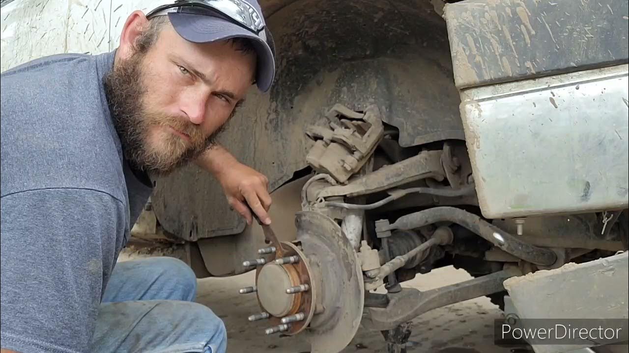 Replacing hub assembly 03 chevy Silverado 2500hd - YouTube