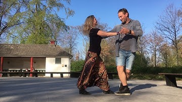 Ivan Raphael and Connie Yndal dancing zouk in a park in Copenhagen