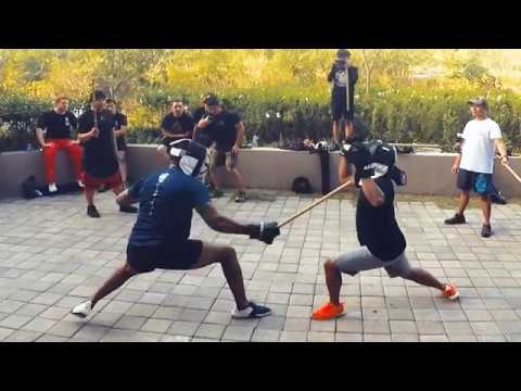 Full Contact Stick Fight with Slow Motion, Play by Play and Action Zooming