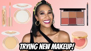 TRYING NEW MAKEUP! | Charlotte Tilbury NEW Concealer & BOTH Brightening Powders Gucci Blush, & MORE!