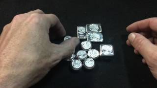 A few bars, buttons and a cube for sale..............all exact weight?