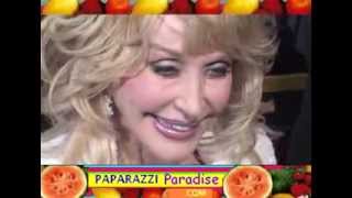 DOLLY PARTON gets amazing facelift