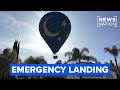 Hot-air balloon makes emergency landing in suburban backyard