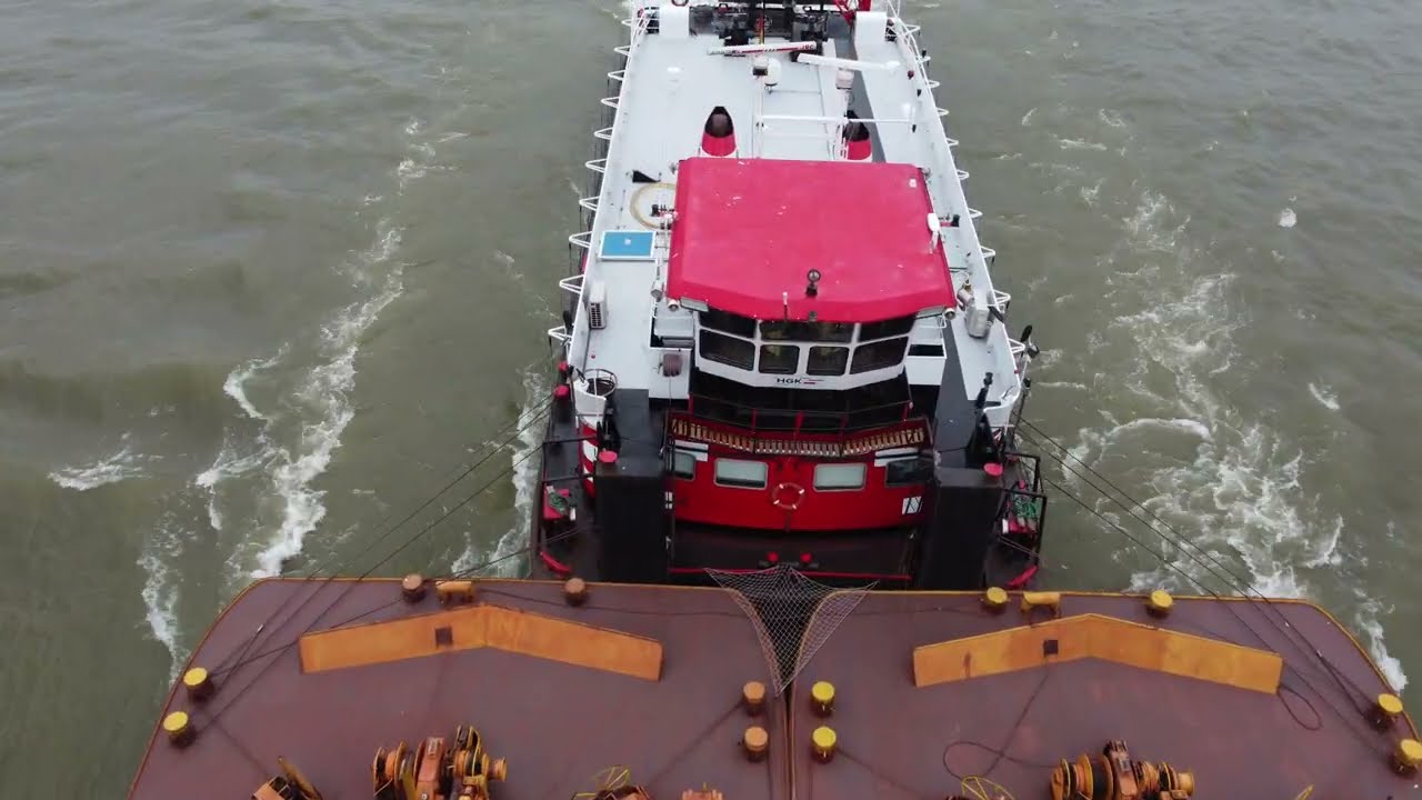 Cargo and Passenger Ships on the River Waal near Castle Loevestijn The Netherlands dd 09-06-2024