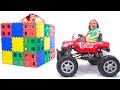 Max and katy playing with blocks and cars