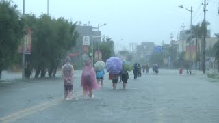River Overflows Banks to Flood a Hainan County in South China