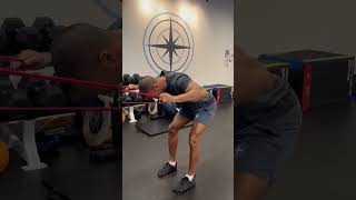 banded bent over pulldown position wing extension drill