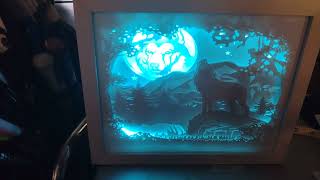 Wolf howls at Moon Shadow Box