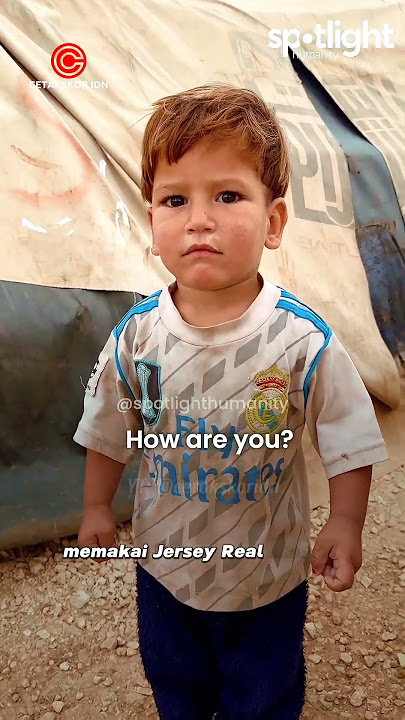 Anak kecil dengan Jersey klub pilhannya