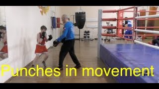 Boxing: young boxer learns to punch in pendulum