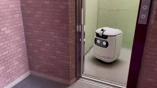 Japan Post , delivery experiment with autonomous mobile delivery robots at auto-lock apartment