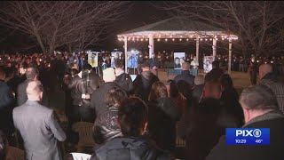NJ fire victims honored at candlelight vigil