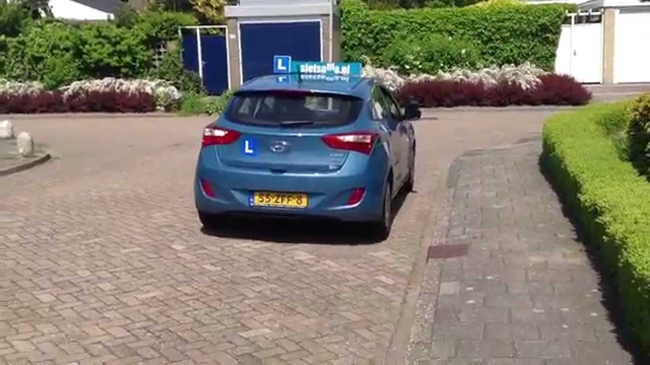 Achteruit rijden in een bocht... - YouTube