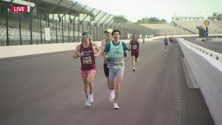 1st runners pass through the Yard of Bricks at IMS during the Indy Mini