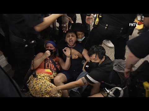 Protesters JUMP ON SUBWAY tracks on NYC 68/Lexington Station, Stop Subway Trains for Jordan Neely