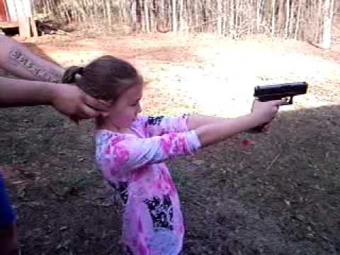 Brianna shooting a Glock 27 (.40 Cal)