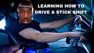 LEARNING HOW TO DRIVE A STICK SHIFT!! (GONE WRONG)