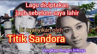 Titik Sandora dengan lagunya yang sangat populer selendang merah 