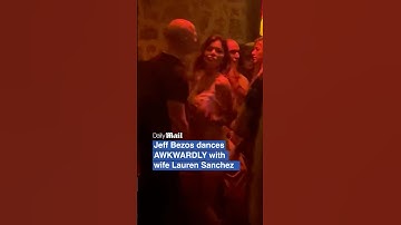 Jeff Bezos and Lauren Sanchez dancing awkwardly together in Ibiza club