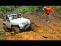 Jeep JK Wrangler Rubicon on 37s climbing at Barnwell Mountain Gilmer, Texas