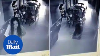 Maid caught on camera appearing to be POSSESSED by evil spirits