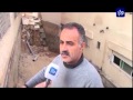 انهيار أجزاء من مبنيين سكنيين
