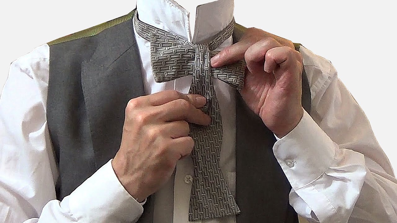 How to tie a bow tie, and a criticism of the dangly sort - YouTube